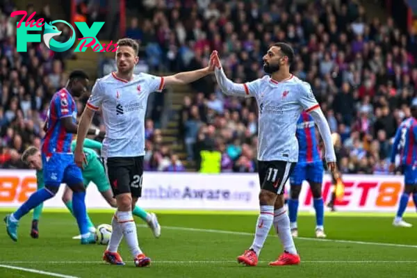 LONDON, ENGLAND - Saturday, October 5, 2024: Liverpool's Diogo Jota (L) celebrates with team-mate Mohamed Salah after scoring the first goal during the FA Premier League match between Crystal Palace FC and Liverpool FC at Selhurst Park. (Photo by David Rawcliffe/Propaganda)