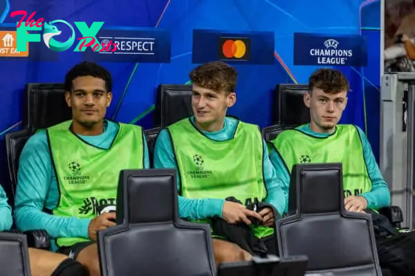 MILAN, ITALY - Tuesday, September 17, 2024: Liverpool substitutes (L-R) Jarell Quansah, Tyler Morton and Conor Bradley on the bench before the UEFA Champions League game between AC Milan and Liverpool FC at the Stadio San Siro. Liverpool won 3-1. (Photo by David Rawcliffe/Propaganda)