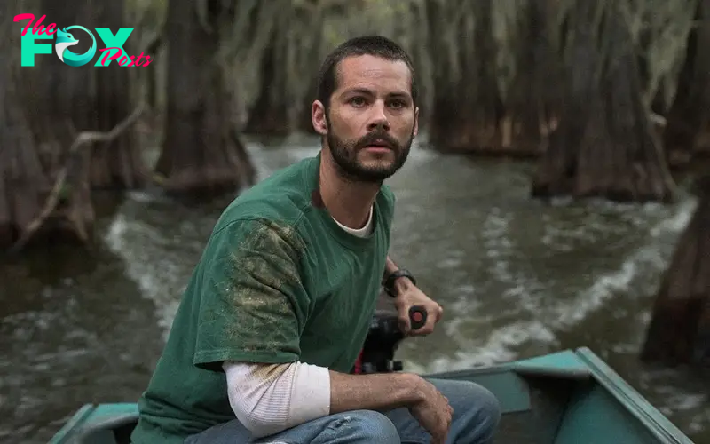 Dylan O’Brien piloting a motorboat in Caddo Lake.