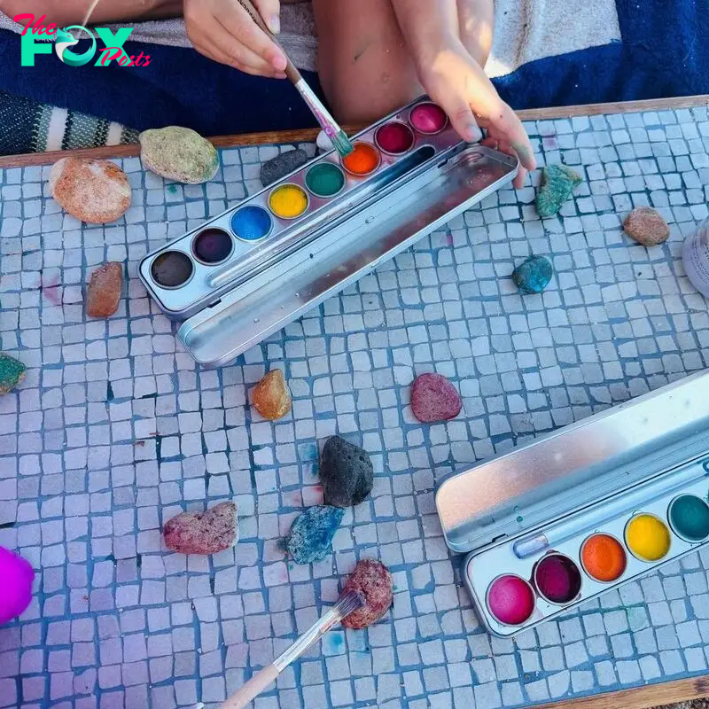 Katy Perry and her daughter Daisy Dove Bloom paint together during a family trip to Sardinia, captured on Instagram