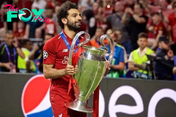 MADRID, SPAIN - SATURDAY, JUNE 1, 2019: Liverpool's Mohamed Salah with the trophy after the UEFA Champions League Final match between Tottenham Hotspur FC and Liverpool FC at the Estadio Metropolitano. Liverpool won 2-0 to win their sixth European Cup. (Pic by David Rawcliffe/Propaganda)