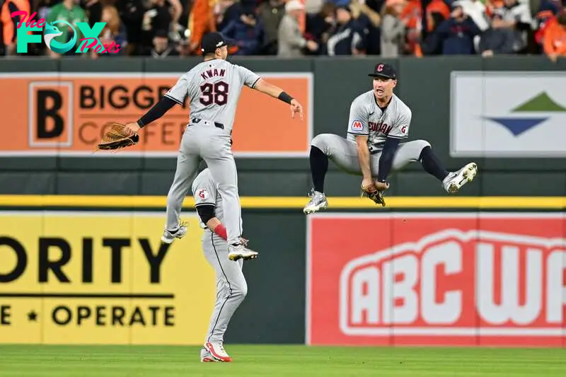 Oct 10, 2024; Detroit, Michigan, USA; Cleveland Guardians outfielder Steven Kwan (38) and outfielder Will Brennan (17)  celebrate after defeating the Detroit Tigers during game four of the ALDS for the 2024 MLB Playoffs at Comerica Park. Mandatory Credit: Lon Horwedel-Imagn Images