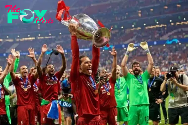 MADRID, SPAIN - SATURDAY, JUNE 1, 2019: Liverpool's Virgil van Dijk lifts the trophy after the UEFA Champions League Final match between Tottenham Hotspur FC and Liverpool FC at the Estadio Metropolitano. Liverpool won 2-0 to win their sixth European Cup. (Pic by David Rawcliffe/Propaganda)