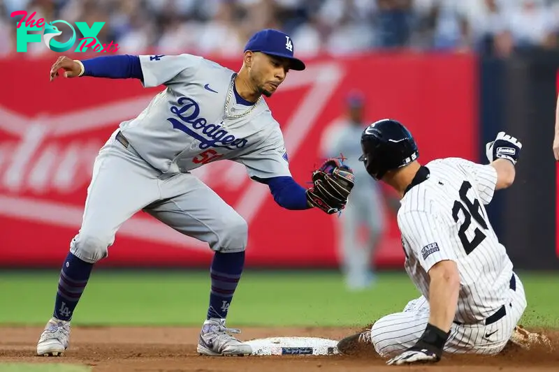 NEW YORK, NEW YORK - JUNE 09: Mookie Betts #50 of the Los Angeles Dodgers tags out DJ LeMahieu #26 of the New York Yankees at second base during the fourth inning at Yankee Stadium on June 09, 2024 in the Bronx borough of New York City.   Luke Hales/Getty Images/AFP (Photo by Luke Hales / GETTY IMAGES NORTH AMERICA / Getty Images via AFP)