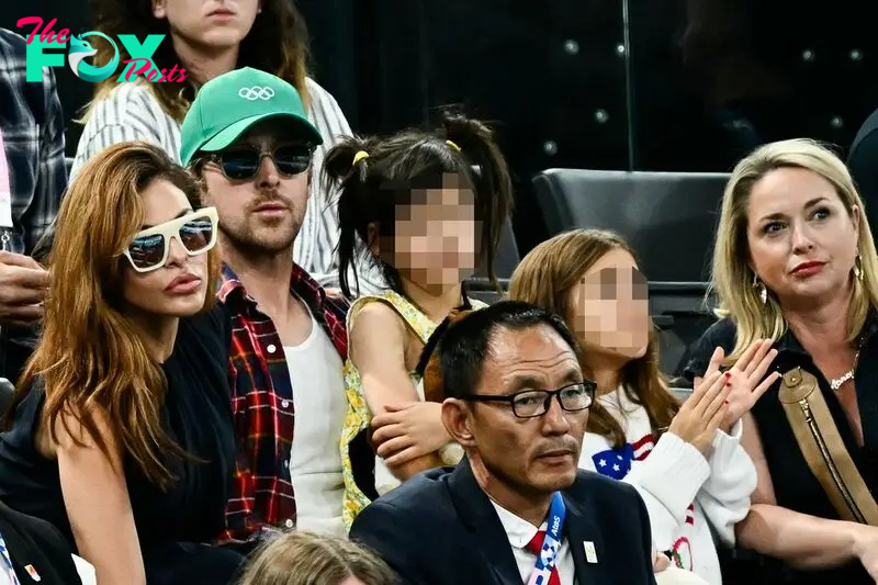 Eva Mendes and Ryan Gosling attend the artistic gymnastics women's uneven bars final during the Paris 2024 Olympic Games at the Bercy Arena in Paris, on August 4, 2024