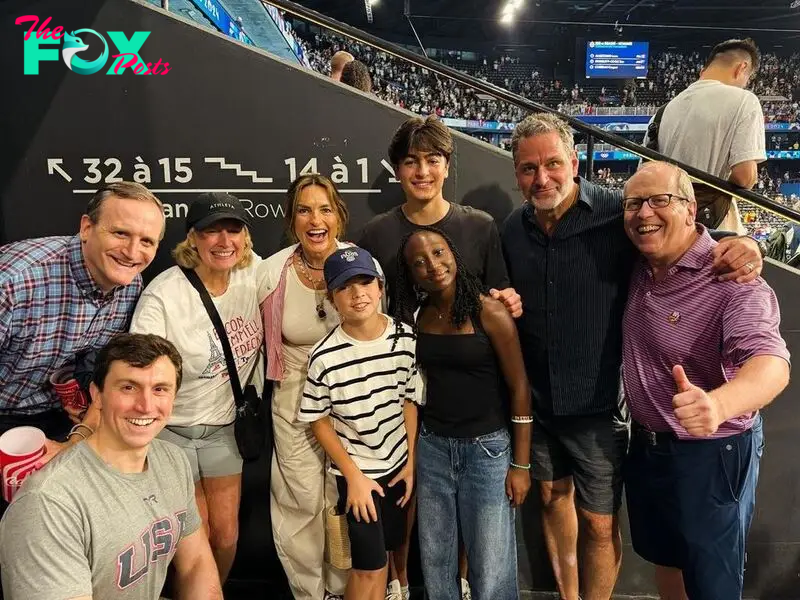 Mariska Hargitay, Peter Hermann, their three children, and the family of Katie Ledecky pose for a photo at the Olympic Games