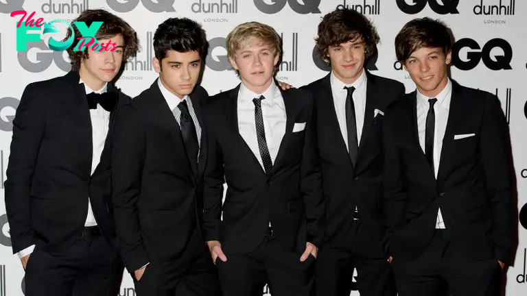 FILE -  One Direction's Liam Payne, second from right, poses for a photo with fellow band members Harry Styles, Zayn Malik, Niall Horan and Liam Tomlinson at the GQ Men of the Year Awards in London, Sept. 6, 2011. (AP Photo/Jonathan Short, File)