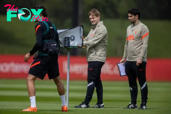 LIVERPOOL, ENGLAND - Wednesday, May 25, 2022: Liverpool's Trent Alexander-Arnold takes a free-kick wearing sensors on his head from Neuro during a training session at the AXA Training Centre ahead of the UEFA Champions League Final game between Liverpool FC and Real Madrid CF. (Pic by David Rawcliffe/Propaganda)