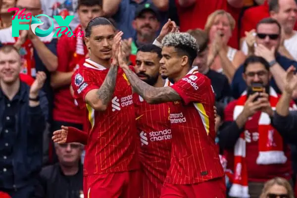 LIVERPOOL, ENGLAND - Saturday, September 21, 2024: Liverpool's Luis Díaz (R) celebrates with team-mates Darwin Núñez (L) and Mohamed Salah (C) after scoring the opening goal during the FA Premier League match between Liverpool FC and AFC Bournemouth at Anfield. Liverpool won 3-0. (Photo by David Rawcliffe/Propaganda)