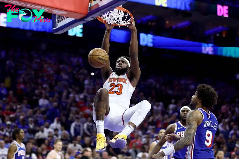 PHILADELPHIA, PENNSYLVANIA - MAY 02: Mitchell Robinson #23 of the New York Knicks dunks against the Philadelphia 76ers during the fourth quarter of game six of the Eastern Conference First Round Playoffs at the Wells Fargo Center on May 02, 2024 in Philadelphia, Pennsylvania.   Tim Nwachukwu/Getty Images/AFP (Photo by Tim Nwachukwu / GETTY IMAGES NORTH AMERICA / Getty Images via AFP)