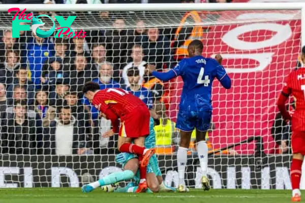 LIVERPOOL, ENGLAND - Saturday, October 19, 2024: Liverpool's Curtis Jones is pushed over Chelsea's goalkeeper Robert Sánchez by Tosin Adarabioyo but the penalty was disallowed after a VAR review during the FA Premier League match between Liverpool FC and Chelsea FC at Anfield. (Photo by David Rawcliffe/Propaganda)