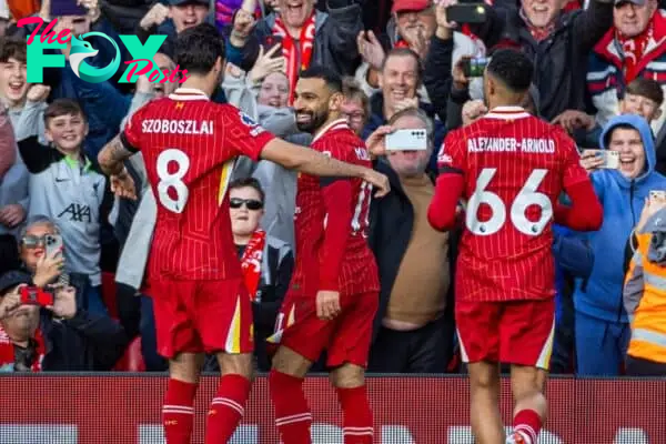 LIVERPOOL, ENGLAND - Saturday, October 19, 2024: Liverpool's Mohamed Salah celebrates after scoring the opening goal from a penalty kick during the FA Premier League match between Liverpool FC and Chelsea FC at Anfield. (Photo by David Rawcliffe/Propaganda)