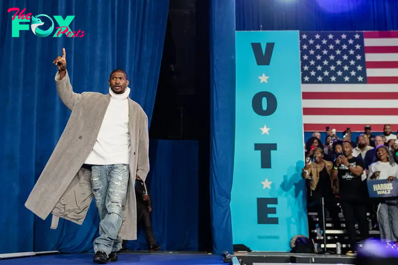 Usher takes the stage at a rally it Atlanta on Oct. 19.