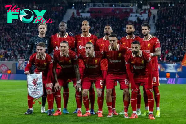 LEIPZIG, GERMANY - Wednesday, October 23, 2024: Liverpool players line-up for a team group photograph before the UEFA Champions League Match Day 3 game between RB Leipzig and Liverpool FC at the Red Bull Arena. Back row L-R: goalkeeper Caoimhin Kelleher, Ibrahima Konaté, captain Virgil van Dijk, Ryan Gravenberch, Cody Gakpo, Dominik Szoboszlai. Front row L-R: Alexis Mac Allister, Darwin Núñez, Kostas Tsimikas, Trent Alexander-Arnold, Mohamed Salah. (Photo by David Rawcliffe/Propaganda)