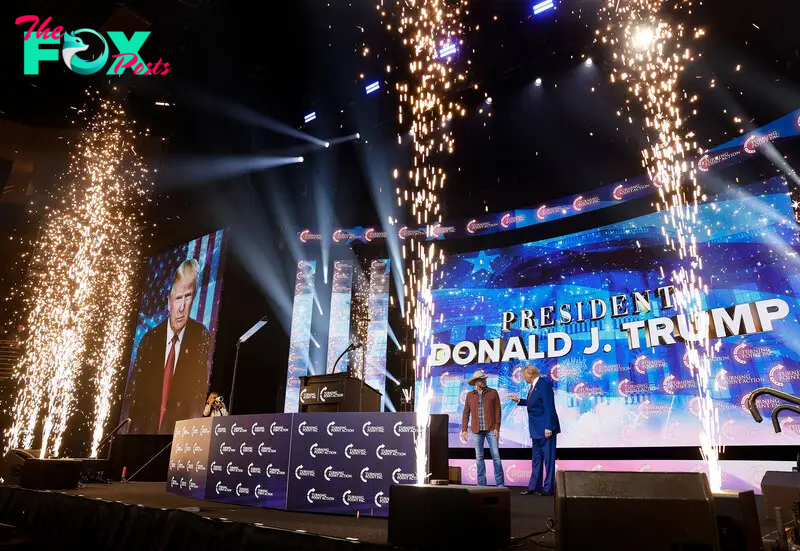 Jason Aldean introduces Trump at a Turning Point PAC campaign rally in Duluth, Ga. on Oct. 23.