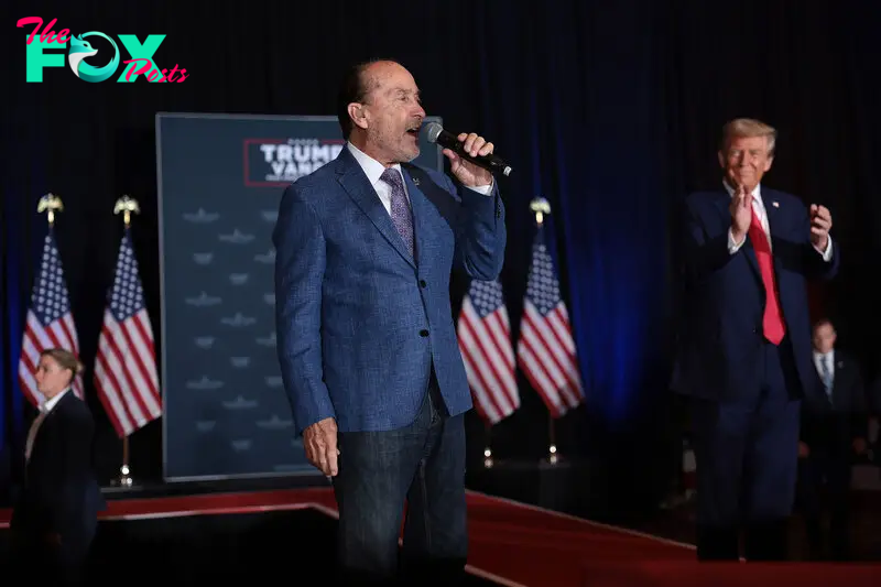 Lee Greenwood sings alongside Trump, during the “11th Hour Family Leaders Meeting” in Concord, N.C. on Oct. 21.