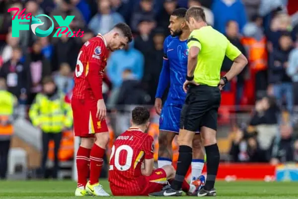 LIVERPOOL, ENGLAND - Saturday, October 19, 2024: Liverpool's Diogo Jota goes down with an injury during the FA Premier League match between Liverpool FC and Chelsea FC at Anfield. Liverpool won 2-1. (Photo by David Rawcliffe/Propaganda)