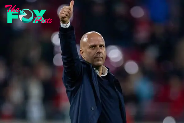 LEIPZIG, GERMANY - Wednesday, October 23, 2024: Liverpool's head coach Arne Slot celebrates after the UEFA Champions League Match Day 3 game between RB Leipzig and Liverpool FC at the Red Bull Arena. Liverpool won 1-0. (Photo by David Rawcliffe/Propaganda)