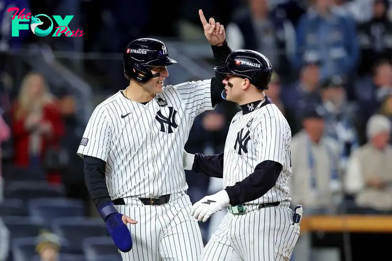 Oct 28, 2024; New York, New York, USA; New York Yankees outfielder Alex Verdugo (24) celebrates with first baseman Anthony Rizzo (48) after hitting a two run home run during the ninth inning against the Los Angeles Dodgers in game three of the 2024 MLB World Series at Yankee Stadium. Mandatory Credit: Brad Penner-Imagn Images