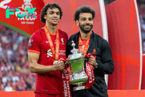 LONDON, ENGLAND - Saturday, May 14, 2022: Liverpool's Trent Alexander-Arnold (L) and Mohamed Salah (R) celebrate with the trophy after the FA Cup Final between Chelsea FC and Liverpool FC at Wembley Stadium. The game ended in a goal-less draw, Liverpool won 6-5 on penalties. (Pic by David Rawcliffe/Propaganda)