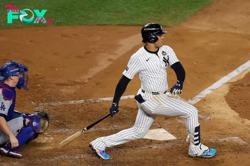 NEW YORK, NEW YORK - OCTOBER 30: Juan Soto #22 of the New York Yankees hits a single during the fourth inning of Game Five of the 2024 World Series against the Los Angeles Dodgers at Yankee Stadium on October 30, 2024 in the Bronx borough of New York City.   Al Bello/Getty Images/AFP (Photo by AL BELLO / GETTY IMAGES NORTH AMERICA / Getty Images via AFP)