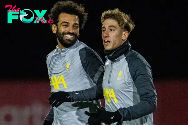 LIVERPOOL, ENGLAND - Tuesday, November 23, 2021: Liverpool's Mohamed Salah (L) and Kostas Tsimikas during a training session at the AXA Training Centre ahead of the UEFA Champions League Group B Matchday 4 game between Liverpool FC and FC Porto. (Pic by David Rawcliffe/Propaganda)