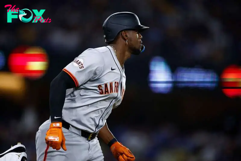 LOS ANGELES, CALIFORNIA - APRIL 02: Jorge Soler #2 of the San Francisco Giants hits a home run against the Los Angeles Dodgers in the sixth inning at Dodger Stadium on April 02, 2024 in Los Angeles, California.   Ronald Martinez/Getty Images/AFP (Photo by RONALD MARTINEZ / GETTY IMAGES NORTH AMERICA / Getty Images via AFP)