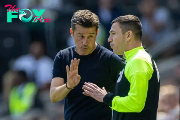 LONDON, ENGLAND - Saturday, August 6, 2022: Fulham's manager Marco Silva speaks with the fourth official Tony Harrington during the FA Premier League match between Fulham FC and Liverpool FC at Craven Cottage. The game ended in a 2-2 draw. (Pic by David Rawcliffe/Propaganda)