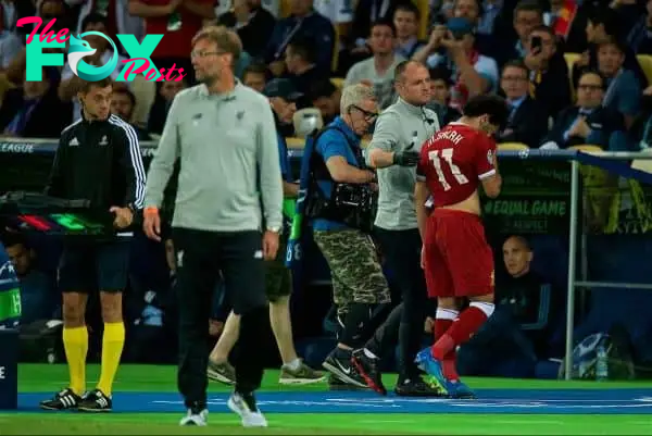 KIEV, UKRAINE - Saturday, May 26, 2018: Liverpool's Mohamed Salah walks off in tears after being substituted with an injury during the UEFA Champions League Final match between Real Madrid CF and Liverpool FC at the NSC Olimpiyskiy. (Pic by Peter Powell/Propaganda)