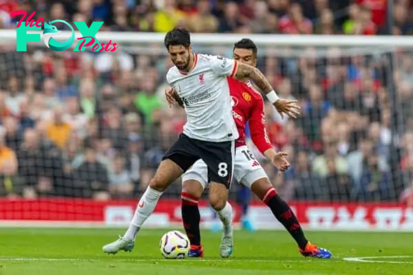 MANCHESTER, ENGLAND - Sunday, September 1, 2024: Liverpool's Dominik Szoboszlai (L) is challenged by Manchester United's Carlos Henrique Casimiro during the FA Premier League match between Manchester United FC and Liverpool FC at Old Trafford. (Photo by David Rawcliffe/Propaganda)