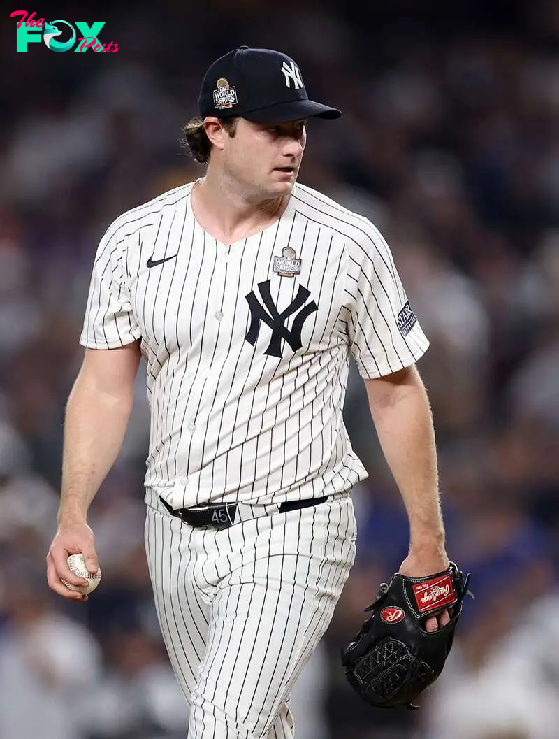 NEW YORK, NEW YORK - OCTOBER 30: Gerrit Cole #45 of the New York Yankees reacts after Teoscar Hern�ndez #37 of the Los Angeles Dodgers hit a two-RBI double during the fifth inning of Game Five of the 2024 World Series at Yankee Stadium on October 30, 2024 in the Bronx borough of New York City.   Sarah Stier/Getty Images/AFP (Photo by Sarah Stier / GETTY IMAGES NORTH AMERICA / Getty Images via AFP)