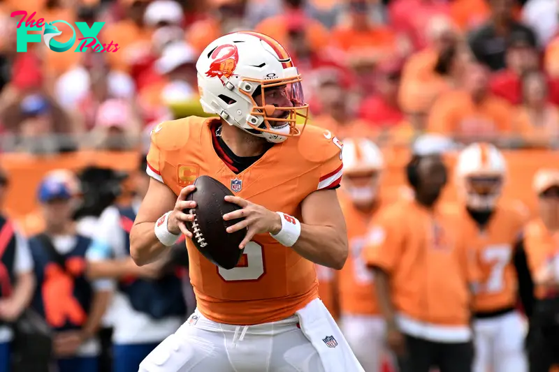 Oct 27, 2024; Tampa, Florida, USA; Tampa Bay Buccaneers quarterback Baker Mayfield (6) drops back to pass in the first half against the Atlanta Falcons at Raymond James Stadium. Mandatory Credit: Jonathan Dyer-Imagn Images