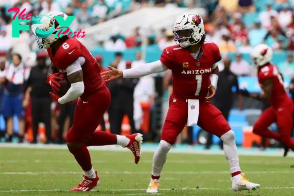 Oct 27, 2024; Miami Gardens, Florida, USA; Arizona Cardinals running back James Conner (6) takes a handoff from quarterback Kyler Murray (1) against the Miami Dolphins during the first quarter at Hard Rock Stadium. Mandatory Credit: Sam Navarro-Imagn Images