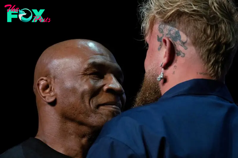 FILE PHOTO: Boxers Mike Tyson and Jake Paul face off during a news conference, ahead of their sanctioned professional fight which was set to take place at AT&T Stadium in Arlington, Texas on July 20, in New York City, U.S., May 13, 2024. REUTERS/David 'Dee' Delgado/File Photo