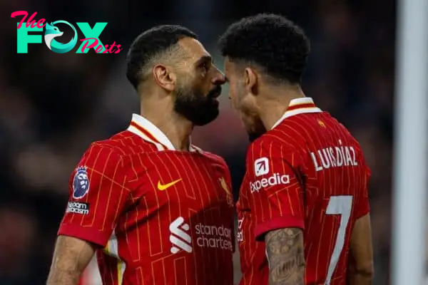 LIVERPOOL, ENGLAND - Saturday, November 2, 2024: Liverpool's Mohamed Salah (L) celebrates with team-mate Luis Díaz after scoring the second goal during the FA Premier League match between Liverpool FC and Brighton & Hove Albion FC at Anfield. (Photo by David Rawcliffe/Propaganda)