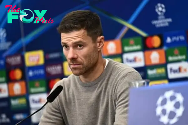 LEVERKUSEN, GERMANY - OCTOBER 01: Xabi Alonso, Head Coach of Bayer 04 Leverkusen, speaks to the media in a post match press conference following the UEFA Champions League 2024/25 League Phase MD2 match between Bayer 04 Leverkusen and AC Milan at BayArena on October 01, 2024 in Leverkusen, Germany. (Photo by Alexander Scheuber - UEFA/UEFA via Getty Images)