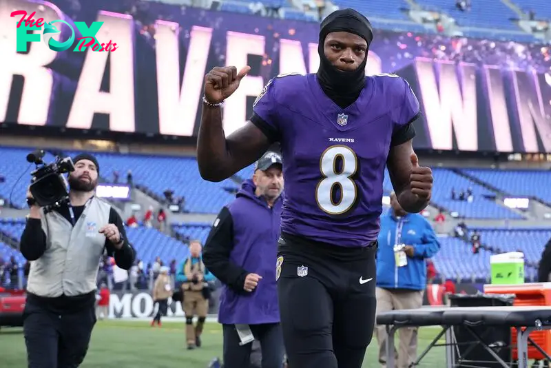 BALTIMORE, MARYLAND - NOVEMBER 03: Lamar Jackson #8 of the Baltimore Ravens runs off the field his team's 41-10 win against the Denver Broncos at M&T Bank Stadium on November 03, 2024 in Baltimore, Maryland.   Scott Taetsch/Getty Images/AFP (Photo by Scott Taetsch / GETTY IMAGES NORTH AMERICA / Getty Images via AFP)