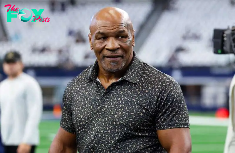 FILE PHOTO: Sep 15, 2024; Arlington, Texas, USA;  Boxer Mike Tyson on the field before the game between the Dallas Cowboys and New Orleans Saints at AT&T Stadium. Mandatory Credit: Kevin Jairaj-Imagn Images/File Photo