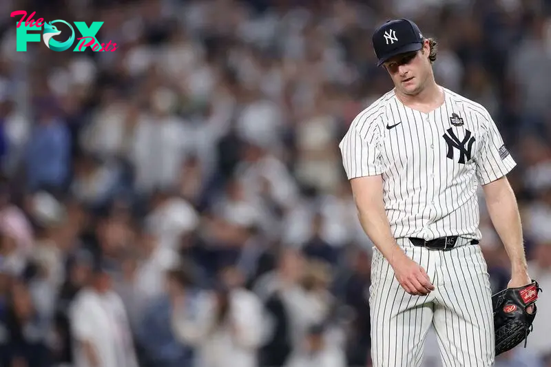 NEW YORK, NEW YORK - OCTOBER 30: Gerrit Cole #45 of the New York Yankees reacts after Teoscar Hern�ndez #37 of the Los Angeles Dodgers hit a two-RBI double during the fifth inning of Game Five of the 2024 World Series at Yankee Stadium on October 30, 2024 in the Bronx borough of New York City.   Sarah Stier/Getty Images/AFP (Photo by Sarah Stier / GETTY IMAGES NORTH AMERICA / Getty Images via AFP)