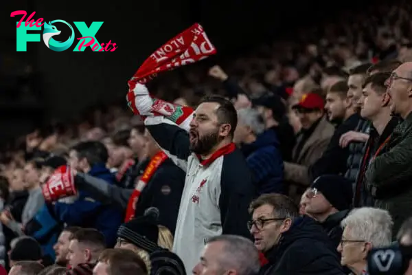 LIVERPOOL, ENGLAND - Saturday, November 2, 2024: A Liverpool supporter celebrates his side's first equalising goal during the FA Premier League match between Liverpool FC and Brighton & Hove Albion FC at Anfield. (Photo by David Rawcliffe/Propaganda)