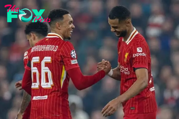 LIVERPOOL, ENGLAND - Wednesday, October 2, 2024: Liverpool's Cody Gakpo (R) celebrates with team-mate Trent Alexander-Arnold after scoring the second goal during the UEFA Champions League game between Liverpool FC and Bologna FC 1909 at Anfield. (Photo by David Rawcliffe/Propaganda)