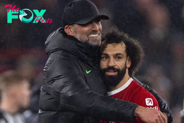 LIVERPOOL, ENGLAND - Monday, January 1, 2024: Liverpool's manager Jürgen Klopp embraces two-goal hero Mohamed Salah after the FA Premier League match between Liverpool FC and Newcastle United FC on New Year's Day at Anfield. Liverpool won 4-2. (Photo by David Rawcliffe/Propaganda)