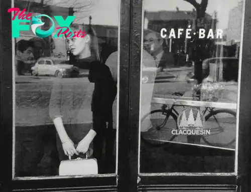 1957---Edouard-Boubat,-Waiting-for-a-date-at-the-Café-Vache-Noir,-Paris