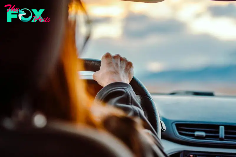 A woman driving | Source: Pexels