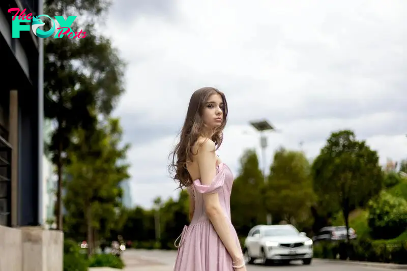 A woman in a pink dress | Source: Pexels