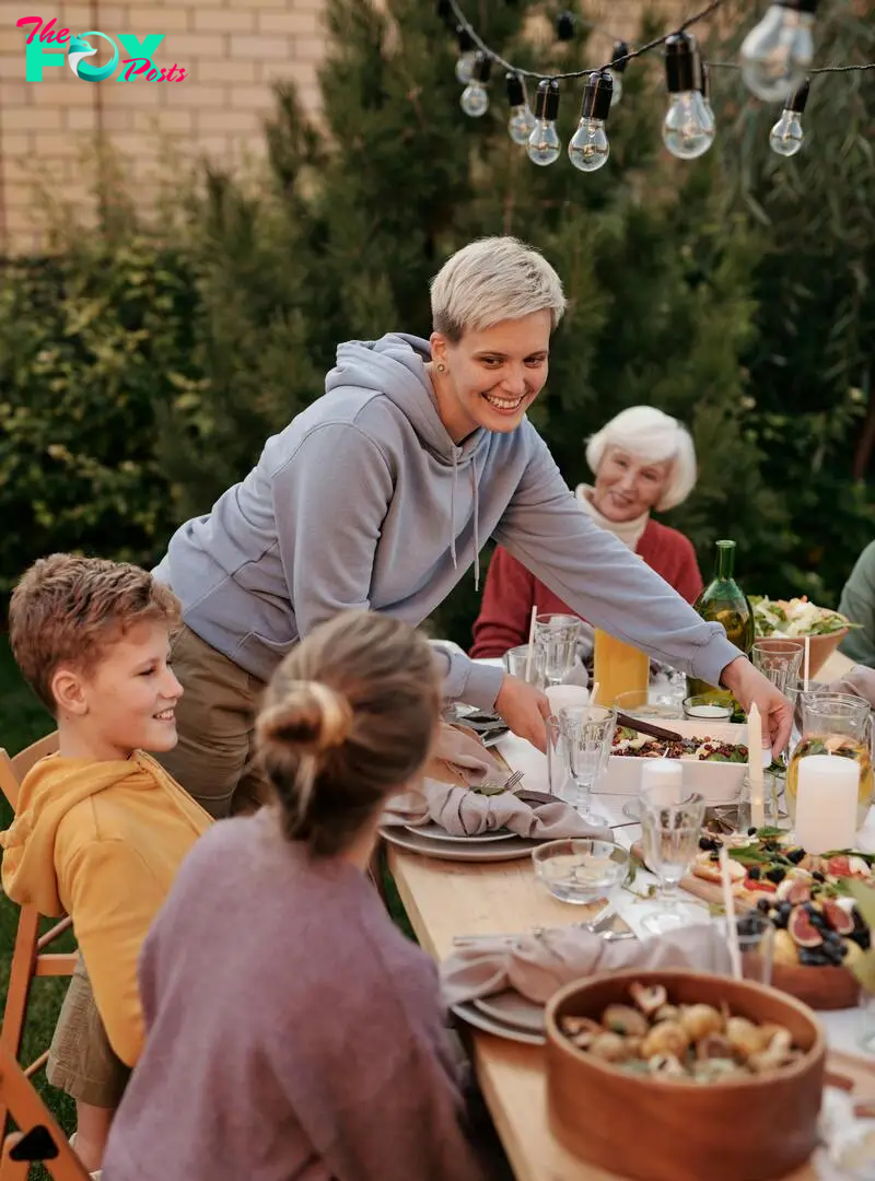 Woman at an outdoor family dinner | Source: Pexels