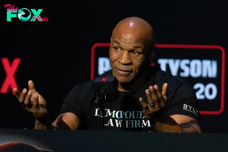 Boxer Mike Tyson attends a news conference, ahead of a sanctioned professional fight versus Jake Paul which is set to take place at AT&T Stadium in Arlington, Texas on July 20, in New York City, U.S., May 13, 2024. REUTERS/David 'Dee' Delgado    REFILE - QUALITY REPEAT