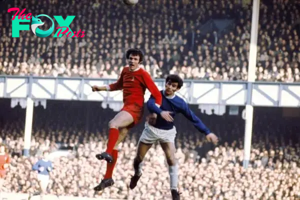 Liverpool's John Toshack (left) beats Everton's Henry Newton (right) in the air, 1972 ( Peter Robinson/EMPICS Sport)