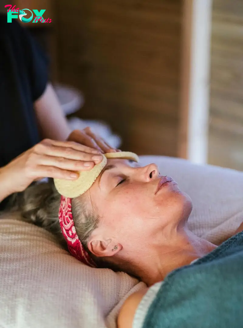 A relaxed woman getting a massage | Source: Pexels