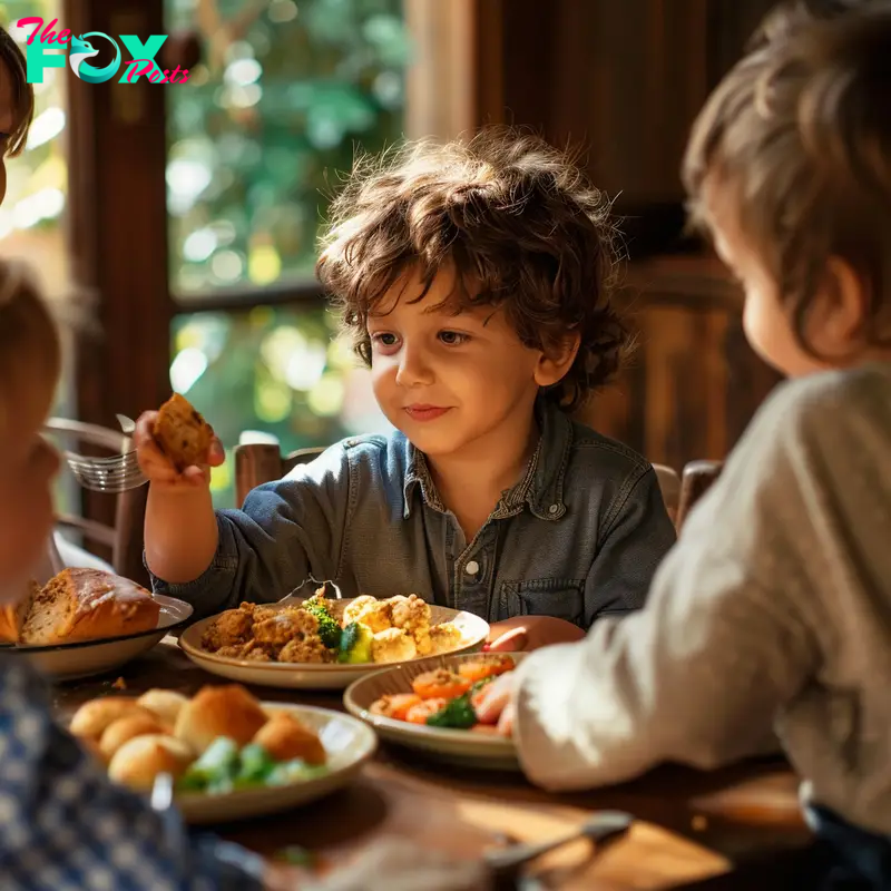 Boy sharing food with his siblings | Source: Midjourney